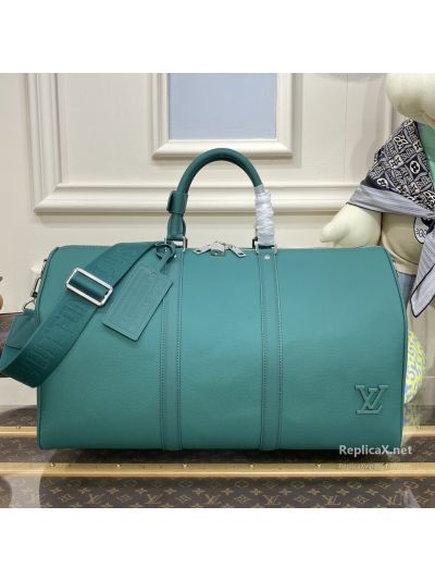 Louis Vuitton Teal Textured Duffle Bag