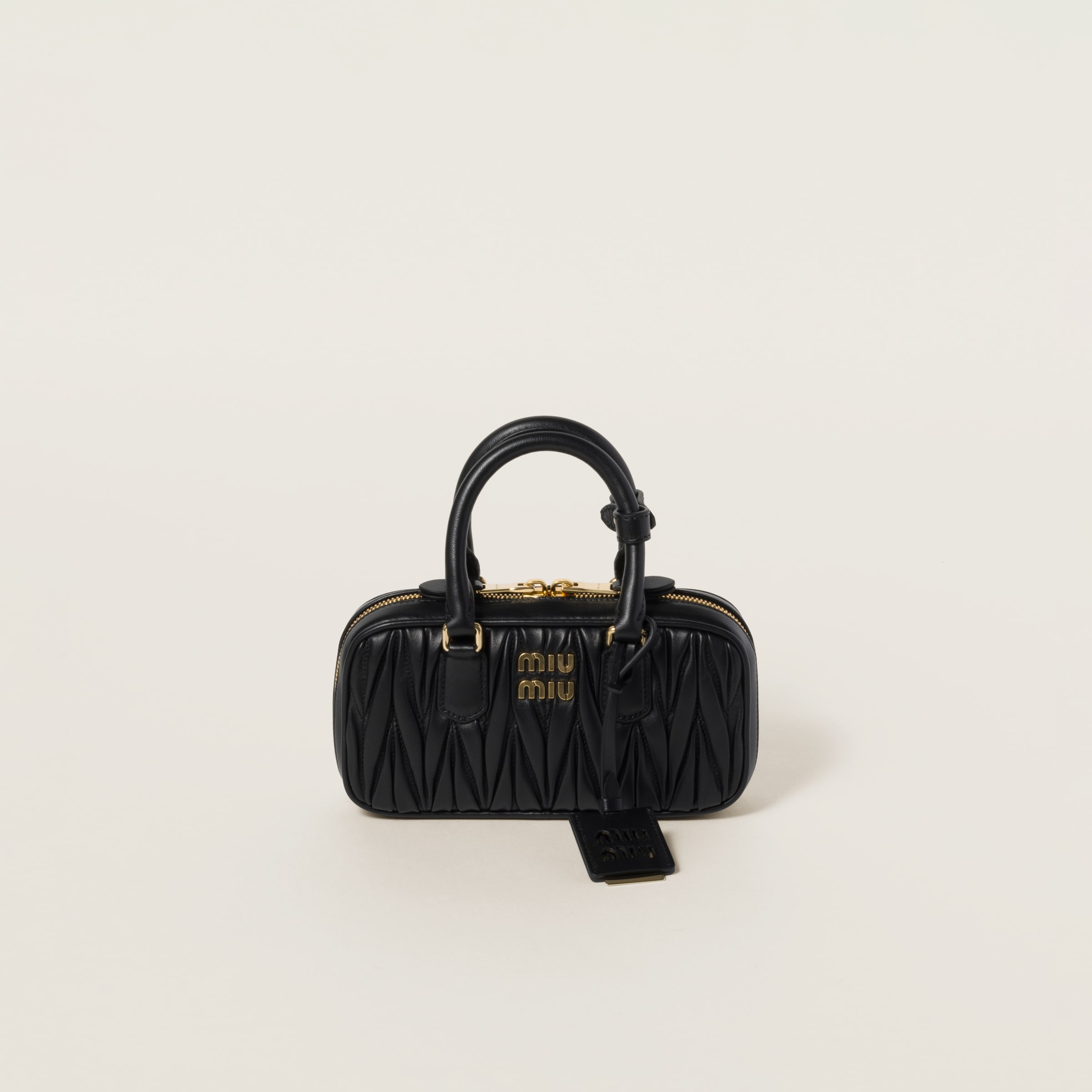 Black Miu Miu Mini Arcadie bag with matelasse finish